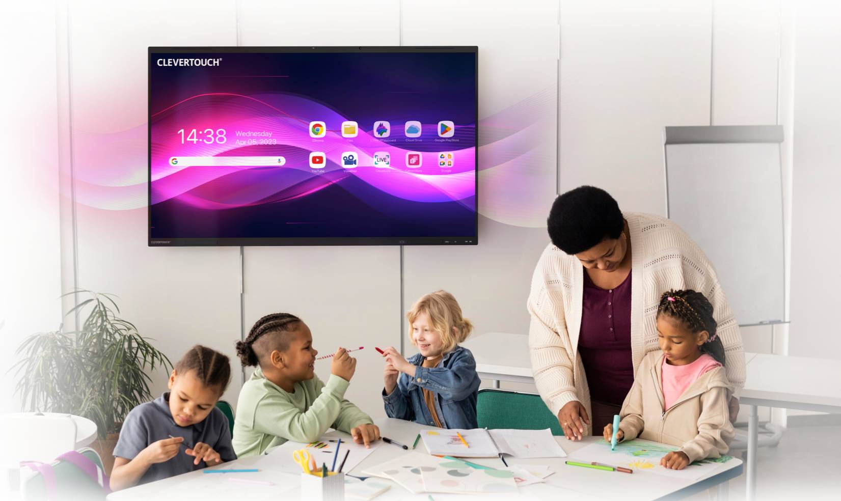 A team collaborating around an interactive display in a modern office